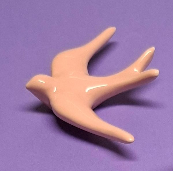 Andorinha pequena rosa