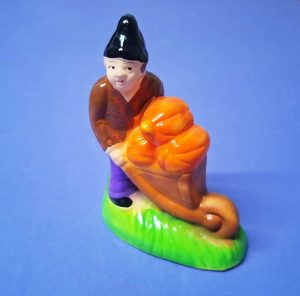 10 - Rapaz com carrinho de abóboras