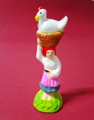 16 - Mulher com peru em cesto na cabeça