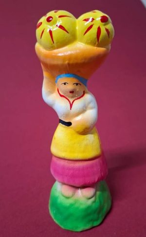 19 - Mulher com duas abororas na cabeça